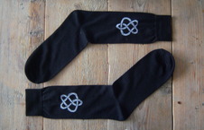 Te koop: Zwarte sokken met logo